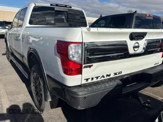 2016 Nissan Titan XD PRO-4X with VIN 1N6BA1F40GN515810, listed as a Copart auction lot 87436204 with 210,650 mi miles and Clean Title. Bid and sale history available at carsss.com. Image 3.