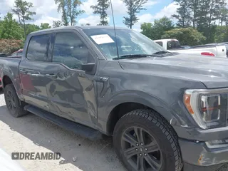 2021 Ford F-150 XL with VIN 1FTFW1E8XMFC04210, listed as a IAAI auction lot 42493373 with 99,181 mi miles and . Bid and sale history available at DreamBid. Image 13.