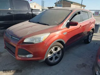 2015 Ford Escape SE with VIN 1FMCU0G73FUC61608, listed as a IAAI auction lot 41993701 with 116,113 mi miles. Bid and sale history available at carsss.com. Image 2.