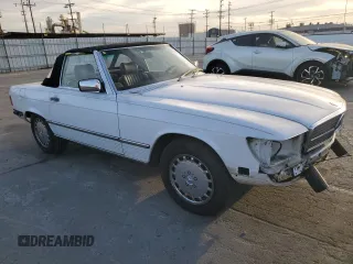1989 Mercedes-Benz 560 Series 560SL with VIN WDBBA48D7KA100290, listed as a Copart auction lot 85049924 with 88,919 mi miles and Salvage Title. Bid and sale history available at carsss.com. Image 4.