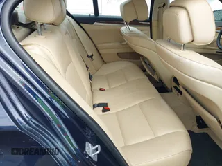 2013 BMW 5 Series 528i xDrive with VIN WBAXH5C52DD115352, listed as a IAAI auction lot 42501265 with 122,421 mi miles and . Bid and sale history available at DreamBid. Image 8.