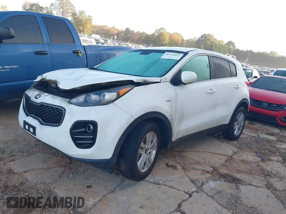 2018 Kia Sportage LX z VIN KNDPMCAC3J7394485, wystawiony jako IAAI lot #41106807 z przebiegiem 104 865 mil mil oraz . Historia ofert i sprzedaży dostępna na DreamBid. Obrazek 2.