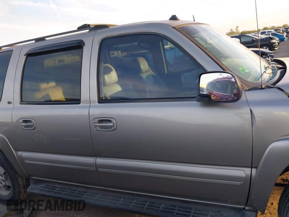 2003 Chevrolet Suburban LT z VIN 3GNEC16Z03G317762, wystawiony jako IAAI lot #40997537 z przebiegiem Nie podano mil oraz . Historia ofert i sprzedaży dostępna na DreamBid. Obrazek 13.