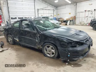 2005 Pontiac Grand Am GT with VIN 1G2NW12E85M140434, listed as a IAAI auction lot 41966294 with 142,548 mi miles. Bid and sale history available at carsss.com. Image 1.
