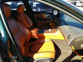 2012 Jaguar XF Portfolio with VIN SAJWA0HBXCLS22773, listed as a IAAI auction lot 41420204 with 145,631 mi miles. Bid and sale history available at carsss.com. Image 5.