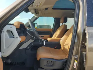 2024 Land Rover Defender S with VIN SALEJ7EU2R2272955, listed as a Copart auction lot 66796994 with 9,079 mi miles and Salvage title. Bid and sale history available at DreamBid. Image 7.