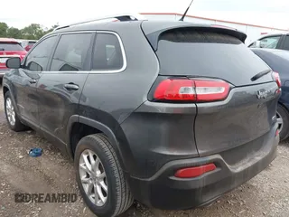 2015 Jeep Cherokee Latitude with VIN 1C4PJLCB6FW547788, listed as a IAAI auction lot 42177621 with 138,945 mi miles and . Bid and sale history available at carsss.com. Image 3.