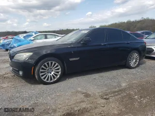 2012 BMW 7 Series 750i xDrive with VIN WBAKC6C57CC396244, listed as a Copart auction lot 52744475 with 153,984 mi miles and Clean Title. Bid and sale history available at carsss.com. Image 1.