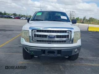 2013 Ford F-150 XL with VIN 1FTFW1ET1DFA58297, listed as a IAAI auction lot 42117924 with 202,830 mi miles and . Bid and sale history available at carsss.com. Image 12.