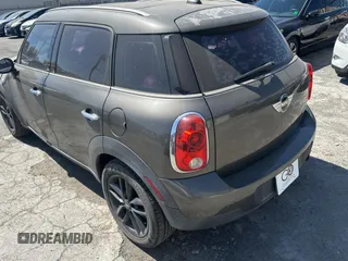 2012 MINI Countryman with VIN WMWZB3C52CWM05723, listed as a Copart auction lot 63713495 with 114,433 mi miles and Clean title. Bid and sale history available at DreamBid. Image 3.
