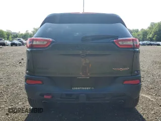 2015 Jeep Cherokee Trailhawk с VIN 1C4PJMBS3FW698997, выставлен на аукционе Copart как лот 63470875 с пробегом 107 535 миль миль и Списание • Salvage title. История ставок и продаж доступна на DreamBid. Изображение 6.