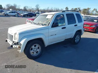 2003 Jeep Liberty Limited with VIN 1J8GL58K33W591945, listed as a IAAI auction lot 41446203 with 196,857 mi miles and . Bid and sale history available at DreamBid. Image 2.