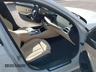 2025 BMW 3 Series 330i with VIN 3MW69CW09S8F10863, listed as a IAAI auction lot 42525396 with 13,155 mi miles and . Bid and sale history available at DreamBid. Image 5.