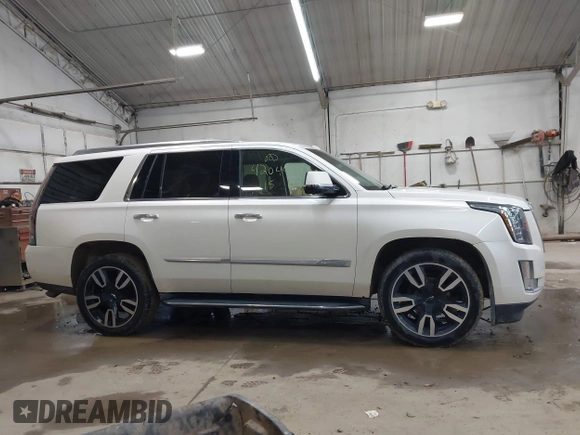 2015 Cadillac Escalade Luxury z VIN 1GYS4MKJ0FR566796, wystawiony jako IAAI lot #42044792 z przebiegiem 176 162 mil mil oraz . Historia ofert i sprzedaży dostępna na DreamBid. Obrazek 13.