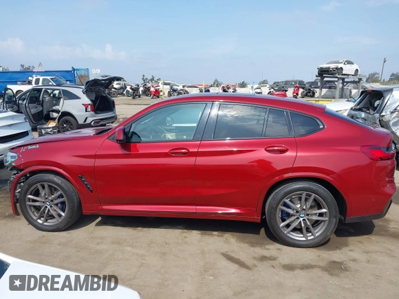 2021 BMW X4 xDrive30i with VIN 5UX2V1C09M9F29509, listed as a IAAI auction lot 42408605 with 46,992 mi miles and . Bid and sale history available at DreamBid. Image 15.