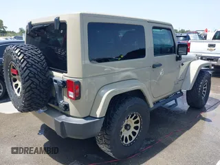 2018 Jeep Wrangler Sahara z VIN 1C4AJWBGXJL811092, wystawiony jako IAAI lot #42305620 z przebiegiem 41 021 mil mil oraz . Historia ofert i sprzedaży dostępna na DreamBid. Obrazek 4.