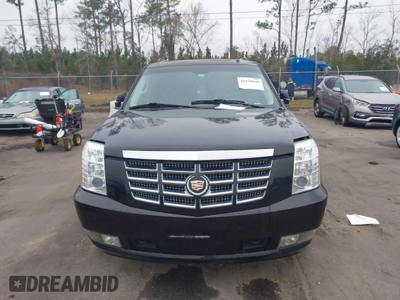 2011 Cadillac Escalade ESV Premium z VIN 1GYS3JEF6BR326994, wystawiony jako IAAI lot #41538648 z przebiegiem 159 768 mil mil oraz . Historia ofert i sprzedaży dostępna na DreamBid. Obrazek 12.