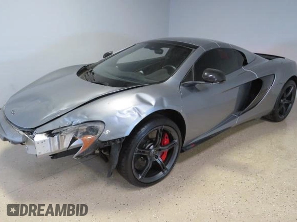 2016 McLaren 650S z VIN SBM11FAA1GW006061, wystawiony jako Copart lot #58605735 z przebiegiem 16 999 mil mil oraz Szkody całkowita. Historia ofert i sprzedaży dostępna na DreamBid. Obrazek 2.