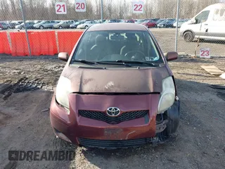 2009 Toyota Yaris with VIN JTDKT903X95258654, listed as a IAAI auction lot 41759756 with 93,810 mi miles. Bid and sale history available at carsss.com. Image 12.