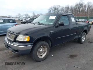 2000 Ford F-150 XL with VIN 1FTRX18WXYNC25817, listed as a IAAI auction lot 41976618 with 148,794 mi miles and . Bid and sale history available at DreamBid. Image 2.
