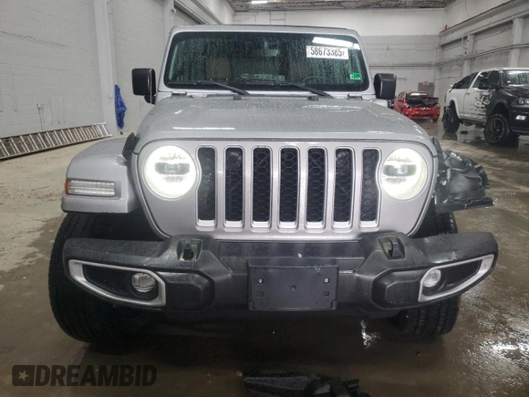 2021 Jeep Wrangler Unlimited Sahara with VIN 1C4JJXP65MW682462, listed as a Copart auction lot 58673385 with 38,714 mi miles and Salvage title. Bid and sale history available at DreamBid. Image 5.