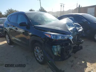 2021 Hyundai Tucson Value with VIN KM8J33A4XMU302596, listed as a IAAI auction lot 41643090 with 58,566 mi miles. Bid and sale history available at carsss.com. Image 1.