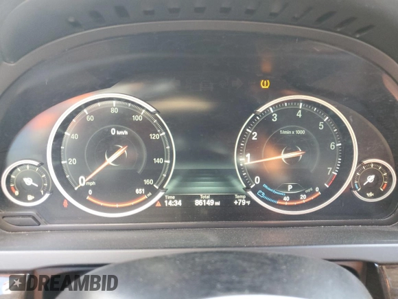 2014 BMW 7 Series 740i with VIN WBAYA6C55ED144487, listed as a Copart auction lot 77044014 with 86,149 mi miles and Salvage Title. Bid and sale history available at carsss.com. Image 9.