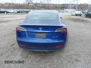 2020 Tesla Model 3 Long Range with VIN 5YJ3E1EB9LF601198, listed as a IAAI auction lot 41744287 with 70,322 mi miles and . Bid and sale history available at DreamBid. Image 17.