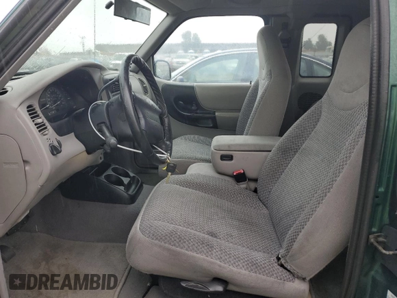 1999 Ford Ranger XLT with VIN 1FTYR14X7XPA76497, listed as a Copart auction lot 86358224 with 194,126 mi miles and Salvage Title. Bid and sale history available at DreamBid. Image 7.