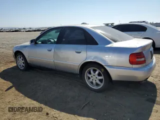 1999 Audi A4 with VIN WAUBB28DXXA299469, listed as a Copart auction lot 65596934 with 207,289 mi miles and Salvage Title. Bid and sale history available at carsss.com. Image 2.