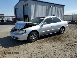 2002 Honda Accord SE с VIN 1HGCG56712A173891, выставлен на аукционе Copart как лот 60232175 с пробегом 215 658 миль миль и Списание • Salvage title. История ставок и продаж доступна на DreamBid. Изображение 1.