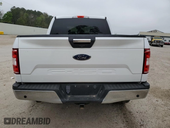 2018 Ford F-150 XL with VIN 1FTEW1C53JKC18828, listed as a Copart auction lot 50357415 with 128,689 mi miles and Salvage Title. Bid and sale history available at DreamBid. Image 6.