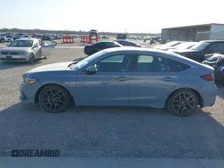2022 Honda Civic Sport Touring z VIN 19XFL1G89NE009751, wystawiony jako IAAI lot #41845803 z przebiegiem Nie podano mil oraz . Historia ofert i sprzedaży dostępna na DreamBid. Obrazek 13.