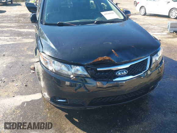 2012 Kia Forte SX with VIN KNAFW4A3XC5563571, listed as a IAAI auction lot 41590629 with 115,993 mi miles. Bid and sale history available at carsss.com. Image 6.