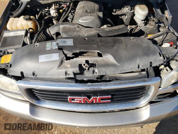 2003 GMC Yukon SLT z VIN 1GKEC13Z03R289219, wystawiony jako Copart lot #45911305 z przebiegiem Nie podano mil oraz Szkoda całkowita • Salvage title. Historia ofert i sprzedaży dostępna na DreamBid. Obrazek 13.