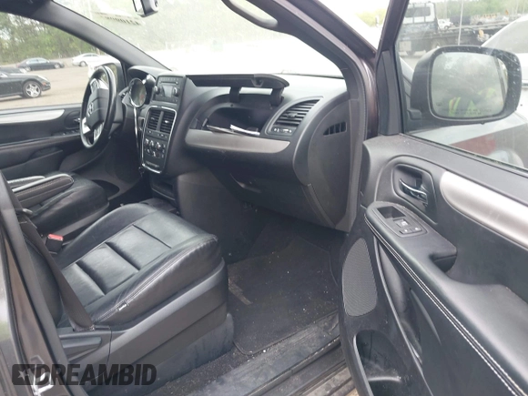 2015 Dodge Grand Caravan American Value with VIN 2C4RDGBG2FR542844, listed as a IAAI auction lot 42109983 with 129,718 mi miles and . Bid and sale history available at DreamBid. Image 5.