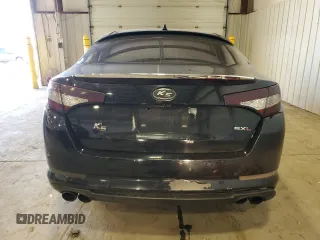 2013 Kia Optima SX с VIN 5XXGR4A69DG129650, выставлен на аукционе Copart как лот 50353705 с пробегом 231 319 миль миль и Списание • Salvage title. История ставок и продаж доступна на DreamBid. Изображение 6.