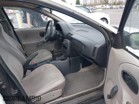 1997 Saturn SL with VIN 1G8ZF5283VZ400170, listed as a IAAI auction lot 41884490 with 171,635 mi miles. Bid and sale history available at carsss.com. Image 5.