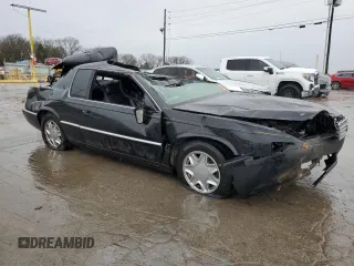 2000 Cadillac Eldorado z VIN 1G6EL12Y7YU190697, wystawiony jako Copart lot #70741434 z przebiegiem Nie podano mil oraz Szkoda całkowita • Salvage title. Historia ofert i sprzedaży dostępna na DreamBid. Obrazek 4.