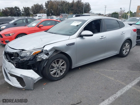 2019 Kia Optima LX with VIN 5XXGT4L3XKG285486, listed as a IAAI auction lot 41872981 with 101,981 mi miles. Bid and sale history available at carsss.com. Image 14.