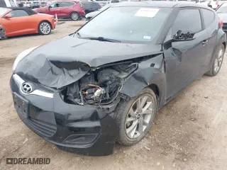 2016 Hyundai Veloster with VIN KMHTC6AD4GU281940, listed as a IAAI auction lot 41261313 with 88,118 mi miles. Bid and sale history available at carsss.com. Image 6.