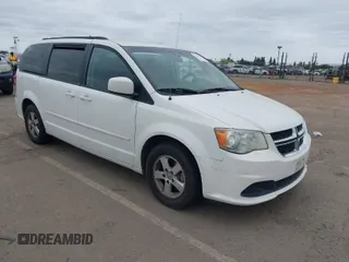 2012 Dodge Grand Caravan SXT with VIN 2C4RDGCGXCR204165, listed as a IAAI auction lot 42064956 with 151,275 mi miles and . Bid and sale history available at DreamBid. Image 1.
