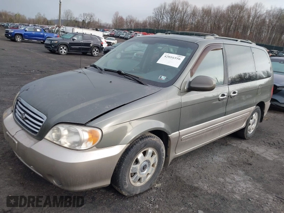 2003 Kia Sedona LX with VIN KNDUP131636378834, listed as a IAAI auction lot 42016556 with 88,751 mi miles and . Bid and sale history available at DreamBid. Image 2.