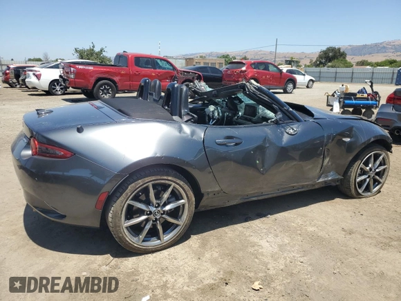 2021 Mazda MX-5 Miata Grand Touring with VIN JM1NDAD79M0458827, listed as a Copart auction lot 62238855 with 20,497 mi miles and Salvage title. Bid and sale history available at DreamBid. Image 3.