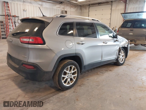 2014 Jeep Cherokee Latitude with VIN 1C4PJLCS1EW106004, listed as a IAAI auction lot 41786457 with 145,588 mi miles. Bid and sale history available at carsss.com. Image 4.