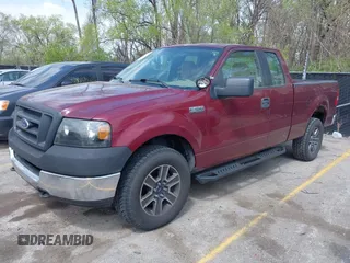2005 Ford F-150 XLT with VIN 1FTPX14575KD79404, listed as a IAAI auction lot 42003073 with 212,050 mi miles. Bid and sale history available at carsss.com. Image 2.