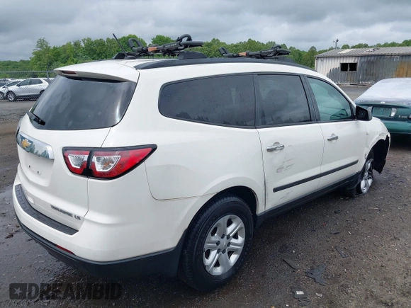 2015 Chevrolet Traverse LS z VIN 1GNKVFED4FJ197970, wystawiony jako IAAI lot #42020771 z przebiegiem 128 876 mil mil oraz . Historia ofert i sprzedaży dostępna na DreamBid. Obrazek 4.