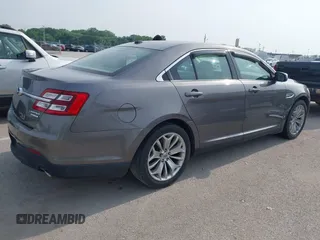 2013 Ford Taurus Limited z VIN 1FAHP2F8XDG185782, wystawiony jako IAAI lot #42474018 z przebiegiem 181 144 mil mil oraz . Historia ofert i sprzedaży dostępna na DreamBid. Obrazek 4.