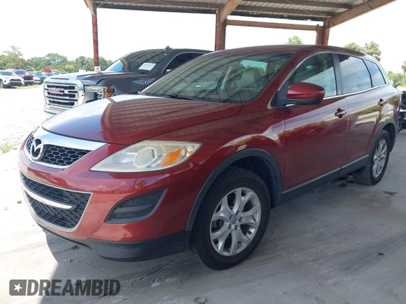 2012 Mazda CX-9 Touring with VIN JM3TB2CA0C0352773, listed as a IAAI auction lot 42676127 with 201,462 mi miles and . Bid and sale history available at DreamBid. Image 2.