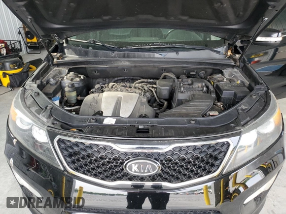 2013 Kia Sorento SX z VIN 5XYKWDA23DG369367, wystawiony jako Copart lot #57721075 z przebiegiem 133 560 mil mil oraz Szkoda całkowita • Salvage title. Historia ofert i sprzedaży dostępna na DreamBid. Obrazek 12.